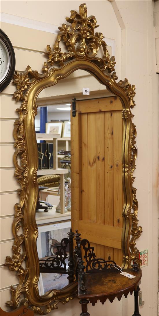 A gilt rococco framed wall mirror W.90cm
